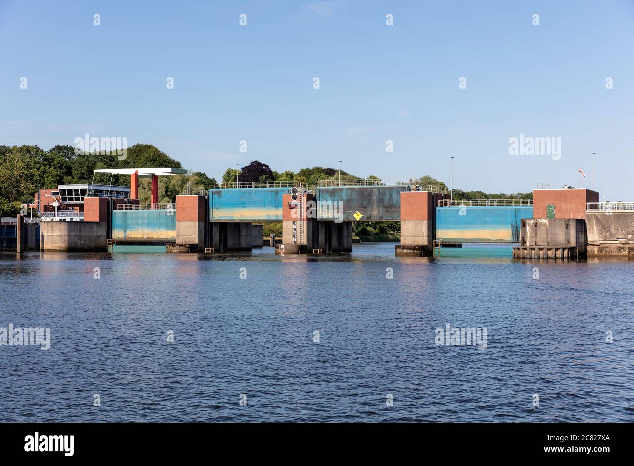 Lesumsperrwerk (Lesum Barrage) in Bremen, Germany. The technical structure on the river Lesum serves as flood protection and as a bridge connection. Stock Photo