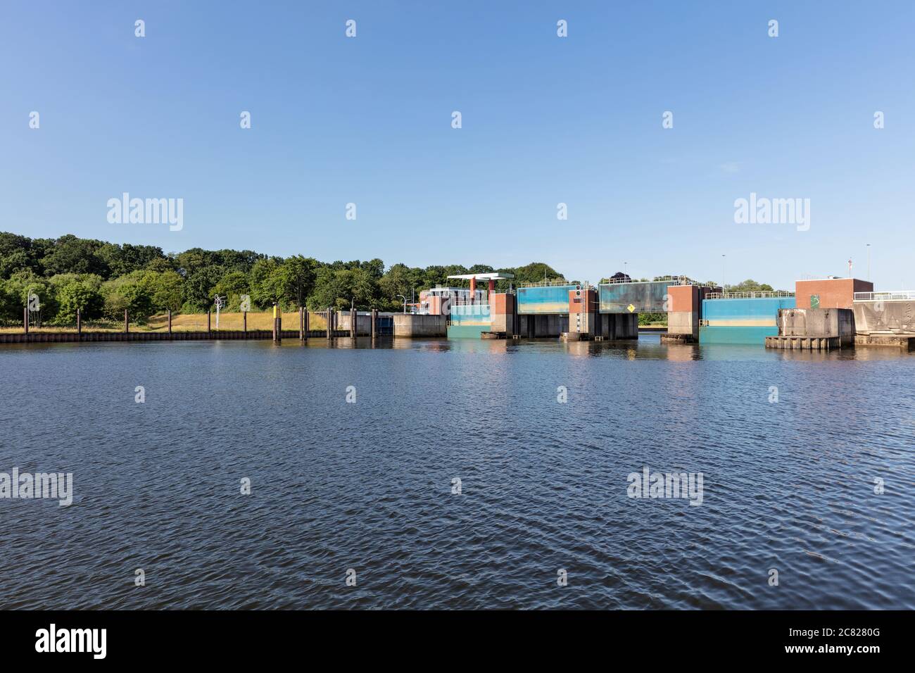 Lesumsperrwerk (Lesum Barrage) in Bremen, Germany. The technical structure on the river Lesum serves as flood protection and as a bridge connection. Stock Photo