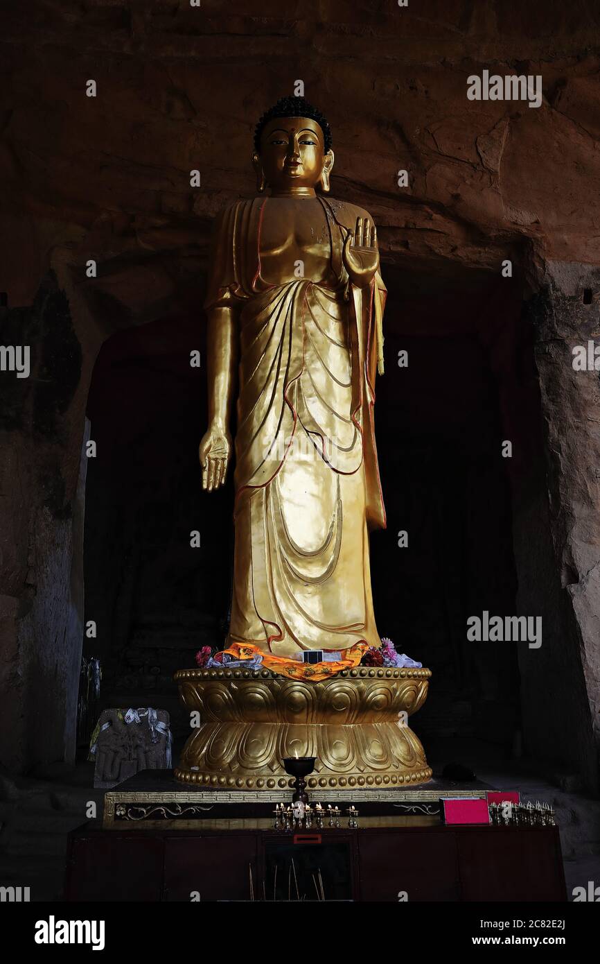 Big gilded statue-Standing Buddha-Tibetan Buddhist Hall-Thirtythree Heaven Grottoes-MatiSi. Sunan County-Zhangye-Gansu-China-0971 Stock Photo