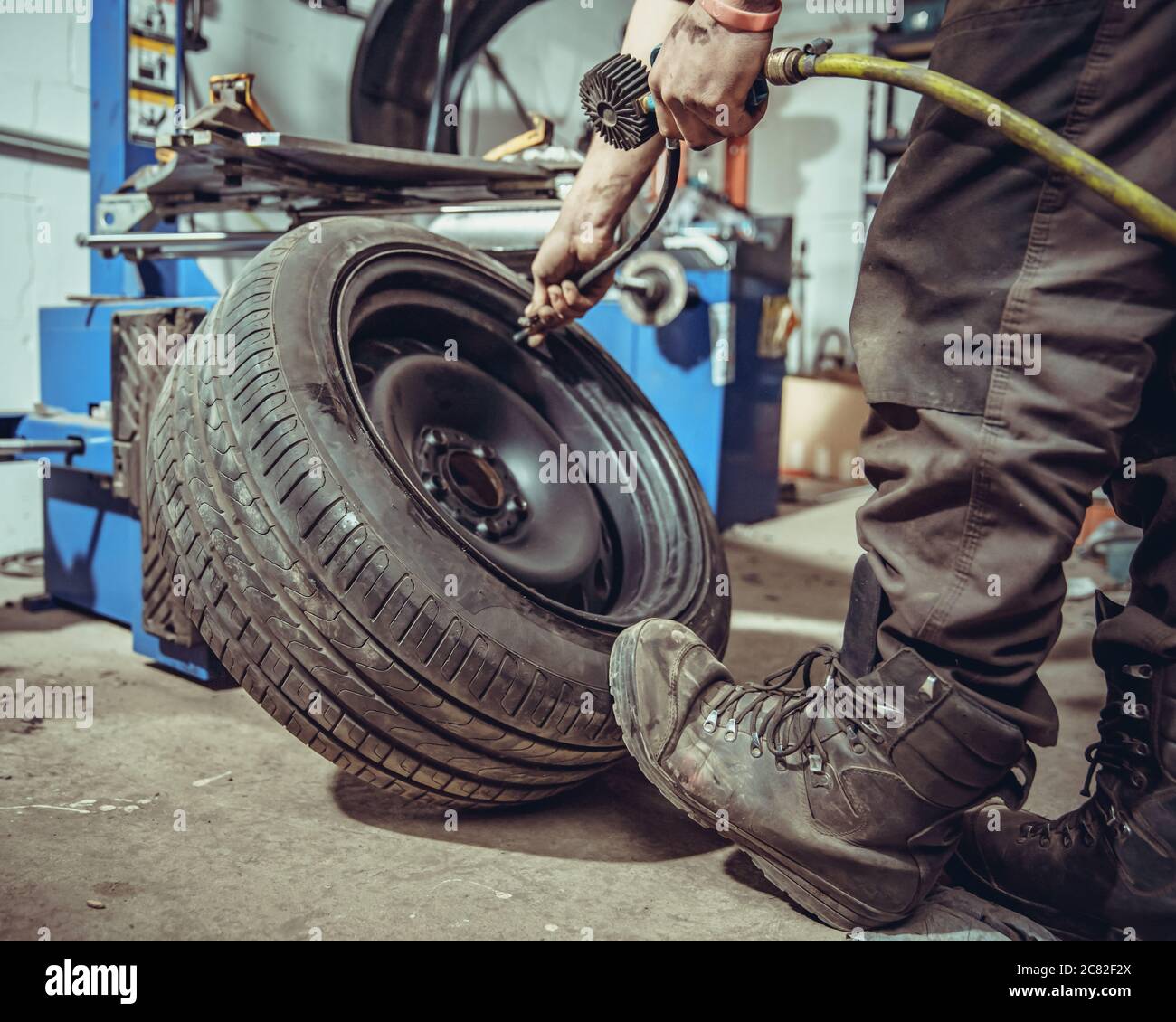 inflation of car tires with compressed air Stock Photo Alamy