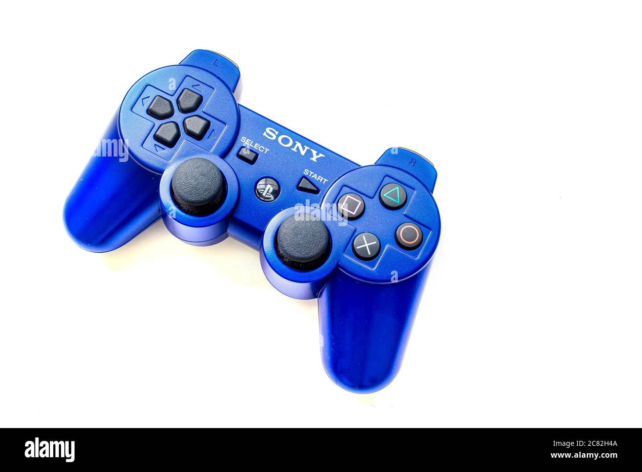 Calgary, Alberta, Canada. July 20, 2020. Blue Sony Play Station control remote on a white background Stock Photo