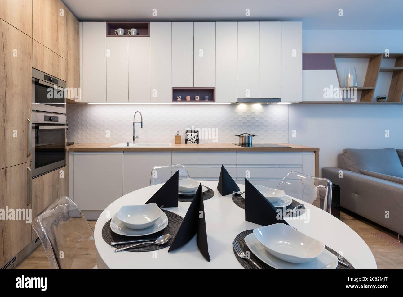 Interior of kitchen in modern apartment Stock Photo - Alamy