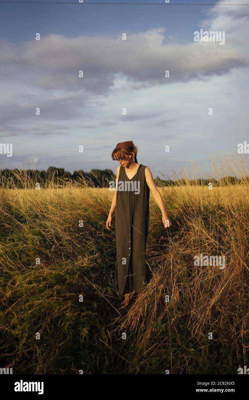 Woman in gorgeous dress walks hi-res stock photography and images - Alamy
