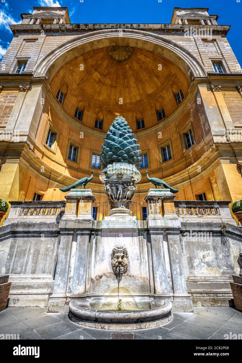 Fontana della Pigna or Pine Cone fountain in Belvedere courtyard of Vatican museums, Rome, Italy. It is landmark of Vatican City, detail of papal pala Stock Photo