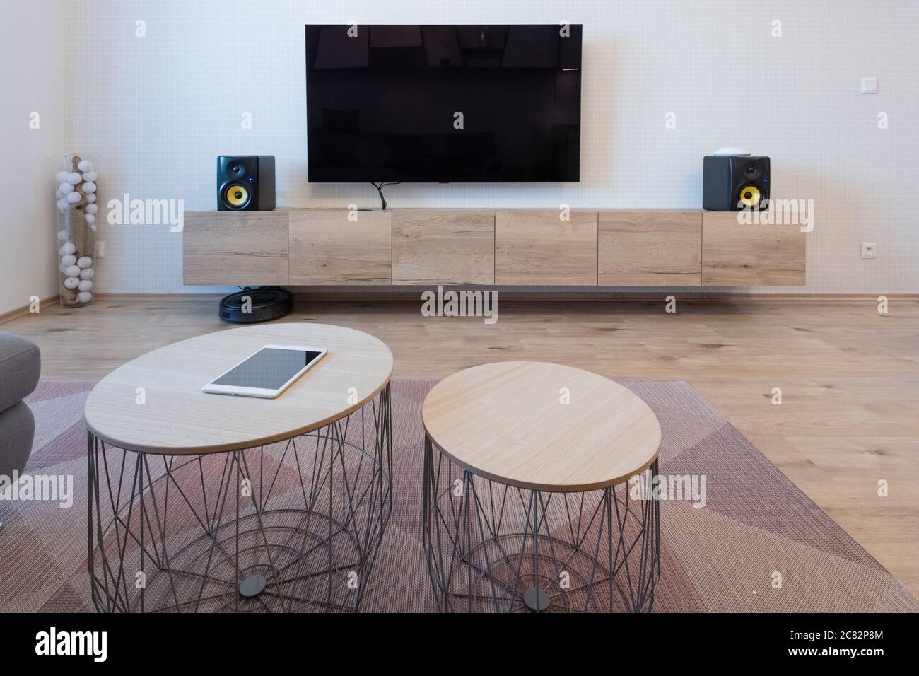 and TV with speakers in living room of modern apartment Stock