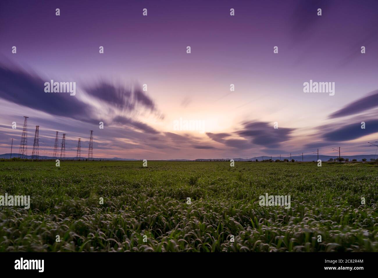 Field cloudy sky sunset cloud sky hi-res stock photography and images ...