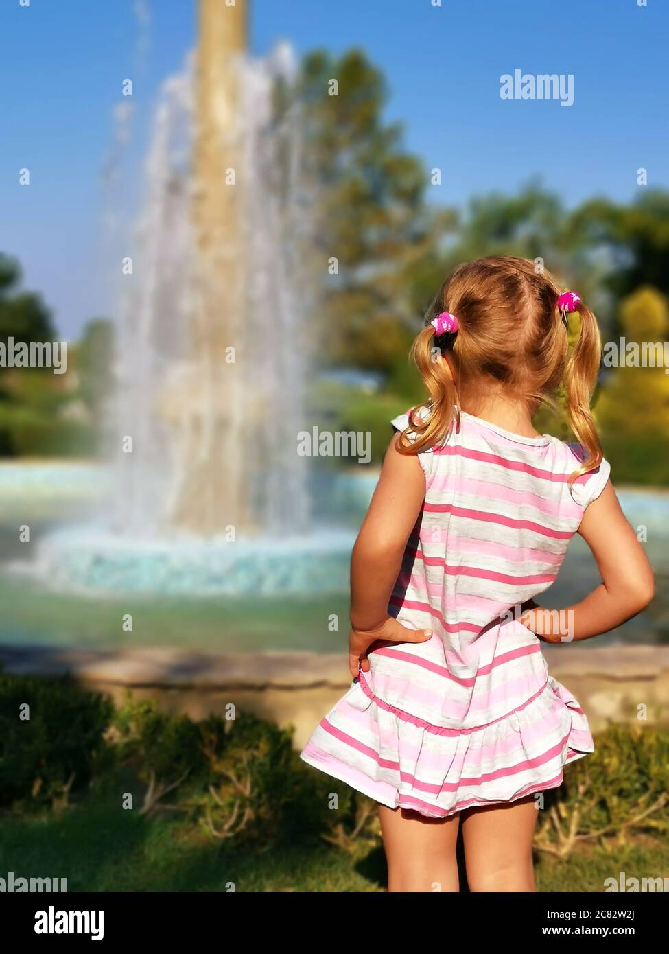 Back view blond little girl hires stock photography and images Alamy