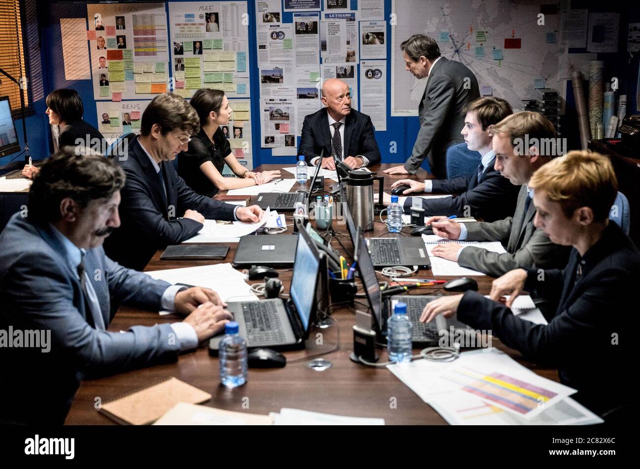 THE BUREAU, (aka LE BUREAU DES LEGENDES), Anne Azoulay (3rd from left),  Laurent Grevill (center), Mathieu Kassovitz (back, standing), (Season 5,  premiered in the US on June 18, 2020). photo: Remy Grandroques / ©