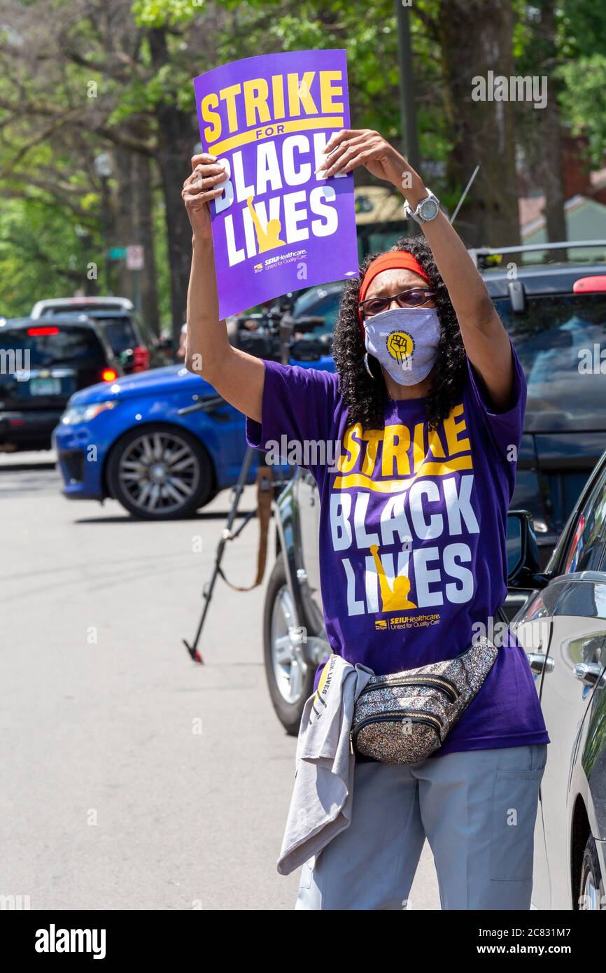 Detroit, Michigan, USA. 20th July, 2020. Nursing home workers rally outside Hartford Nursing and Rehabilitation Center during the nationwide 'Strike for Black Lives.' The strikers, members of the Service Employees International Union, were supported by Teamsters and other union members. SEIU says more than 50,000 nursing home residents and workers have died from Covid-19 during the pandemic. Credit: Jim West/Alamy Live News Stock Photo