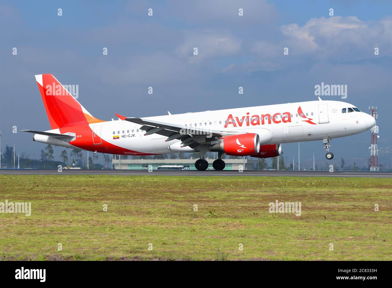 Avianca Airlines Airbus A320 landing at Quito Mariscal Sucre International Airport. Ecuadorian registered airplane  HC-CJV. Stock Photo