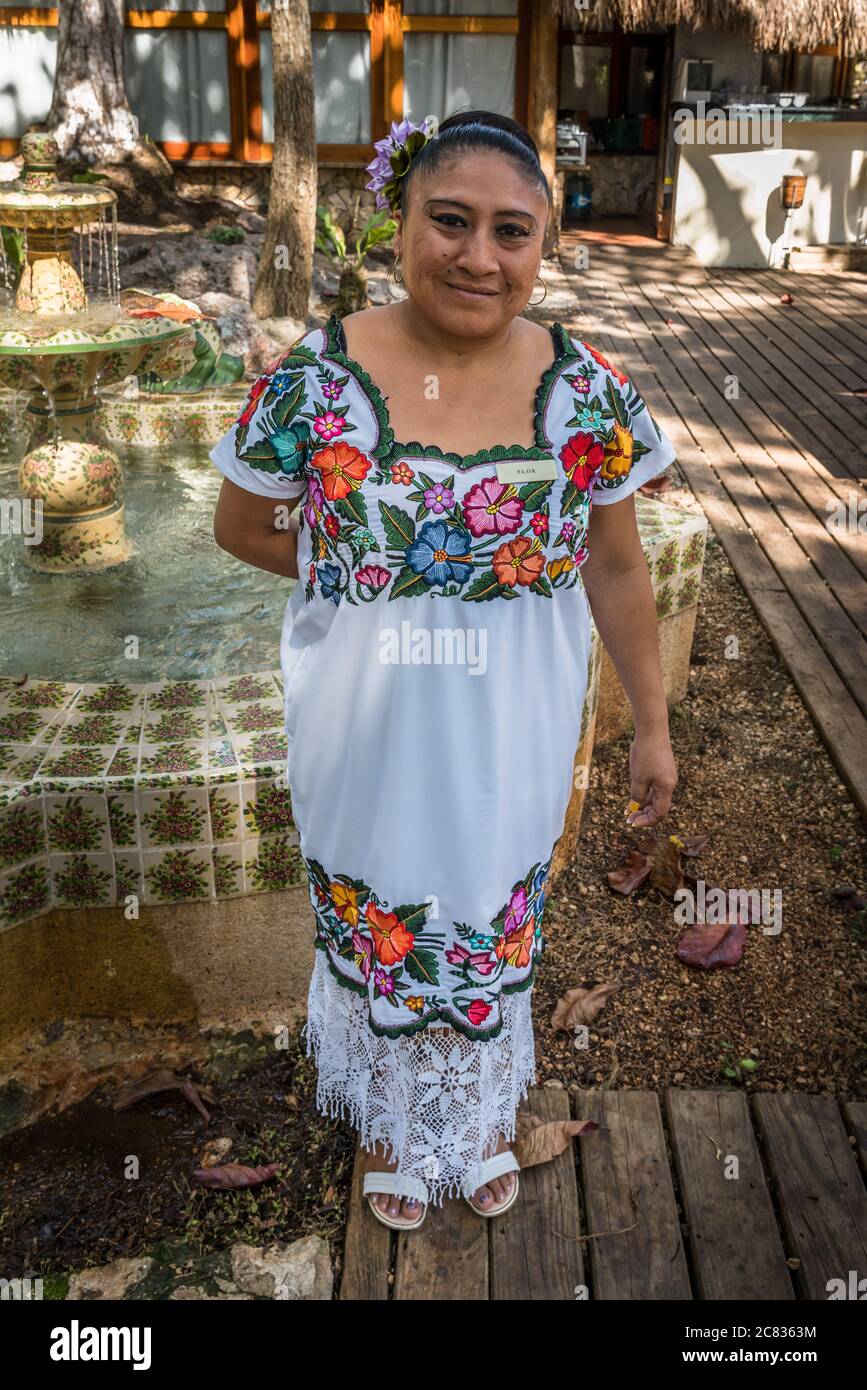 Portrait of a Mayan woman in a traditional embroidered huipil (long blouse)  and crocheted skirt at the Mayaland Hotel near Chichen Itza, Yucatan, Mexi  Stock Photo - Alamy