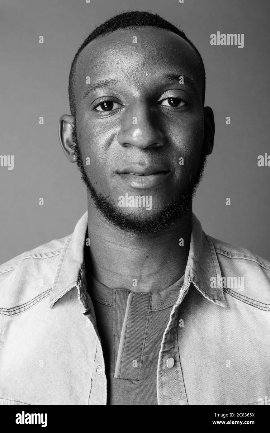 African american man in denim shirt hi-res stock photography and images ...