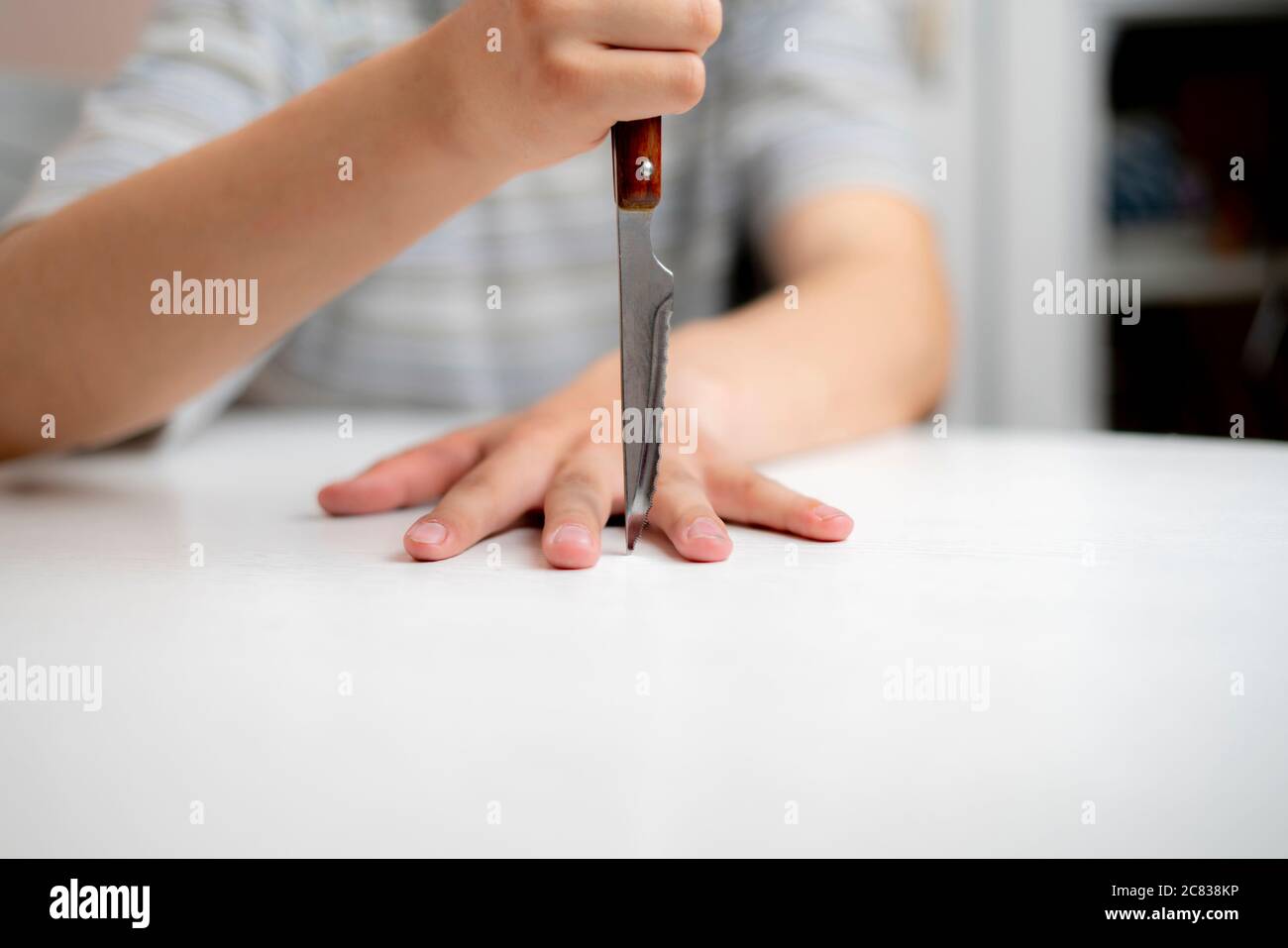 Knife finger game hires stock photography and images Alamy