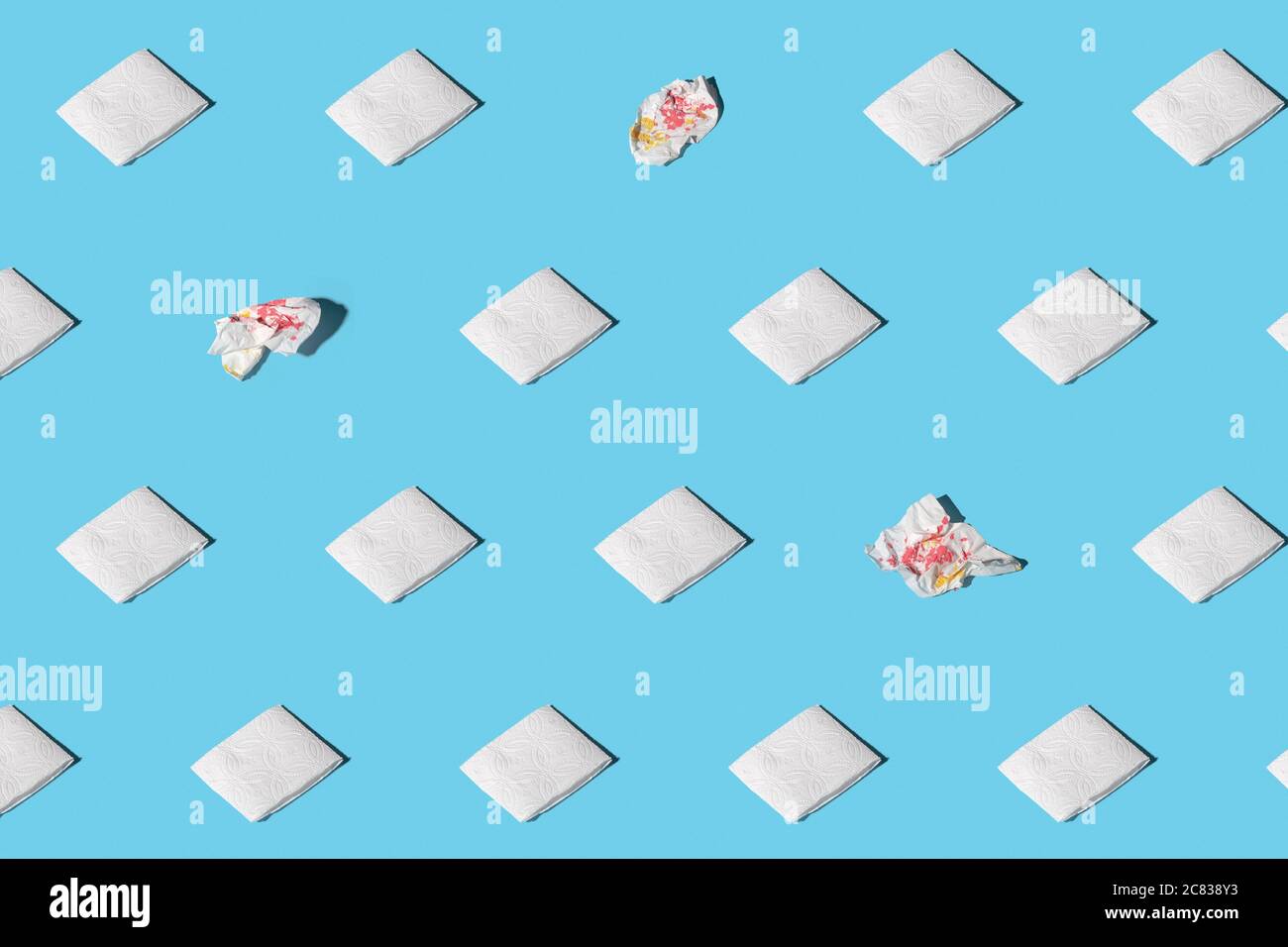 Trendy pattern from clean and used napkins. Concept of exclusiveness, uniqueness. Paper towels with soft shadow. Isometric pattern on blue background Stock Photo