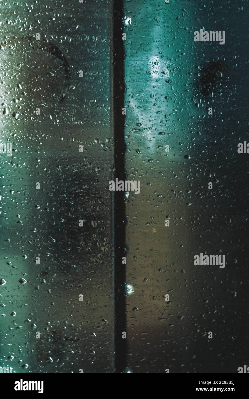 Closeup shot of the natural water drops on the window glass Stock Photo ...