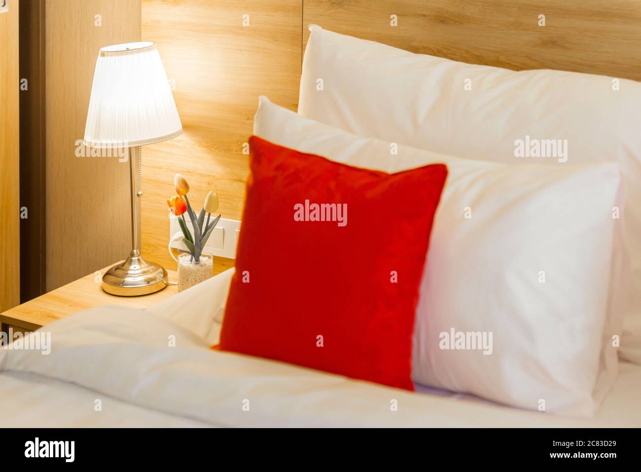 Lights beside the bed inside the hotel room Stock Photo Alamy
