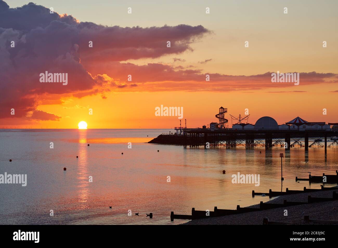 Herne Bay, Kent, UK. 21st July 2020: UK Weather. Sunrise at Herne Bay in Kent as the warm weather continues. Credit: Alan Payton/Alamy Live News Stock Photo