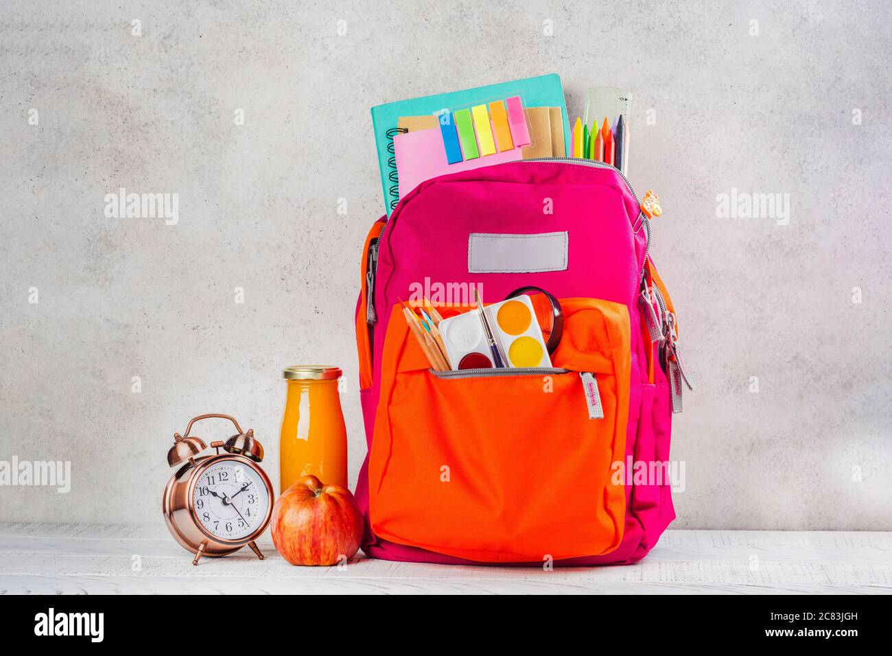 Back pack with school utensils Stock Photo Alamy
