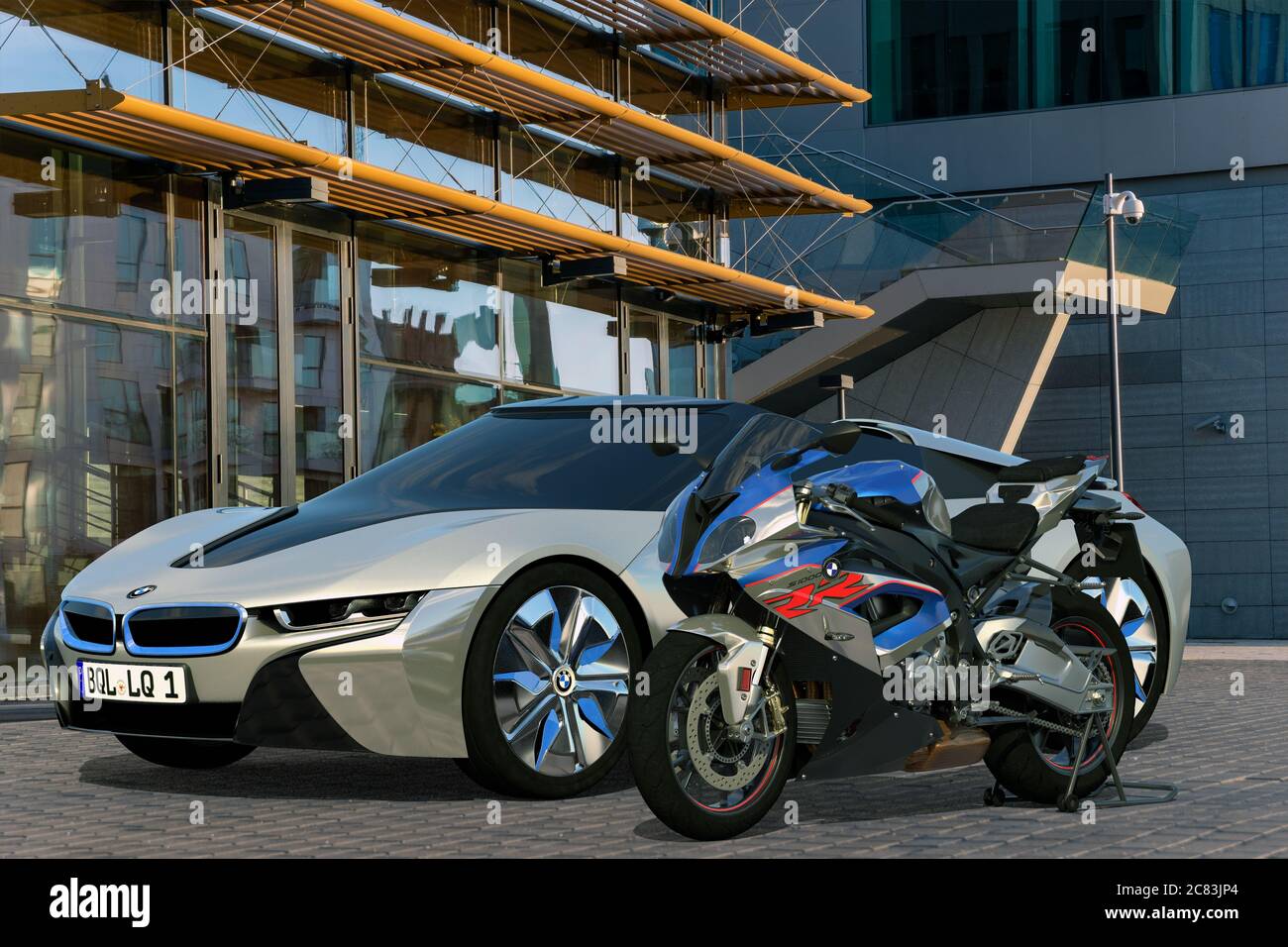 BMW S1000RR motorcycle versus BMW I8 electric sports coupe Stock Photo