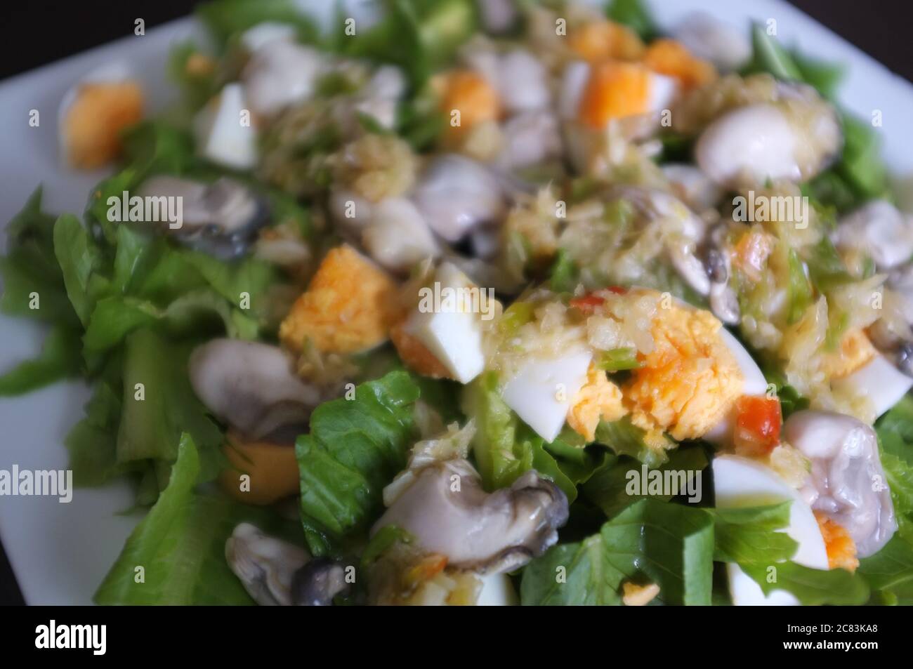 Spicy uncooked oyster with thai herbs . Seafood menu served at Thai