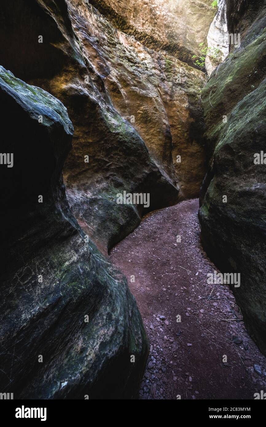 Breathtaking view of the narrow path between the enormous rocks Stock ...