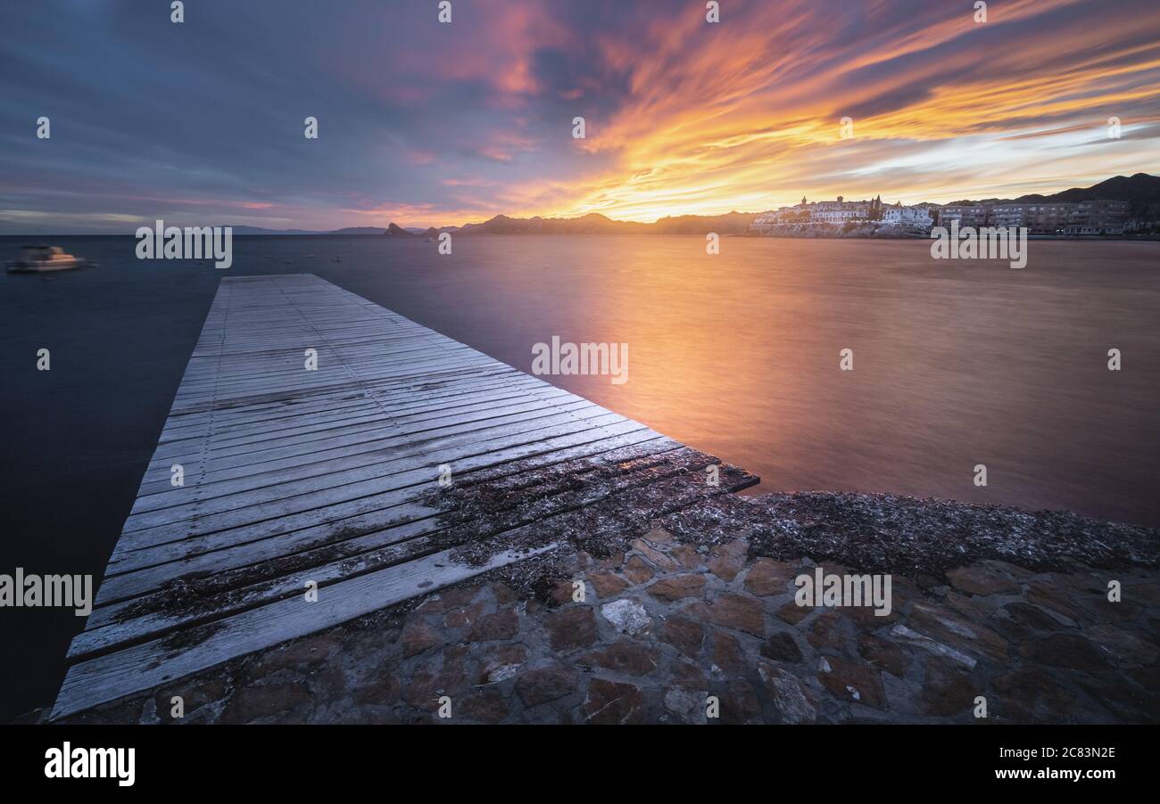 Breathtaking view of the seascape with a wooden pier at the scenic ...