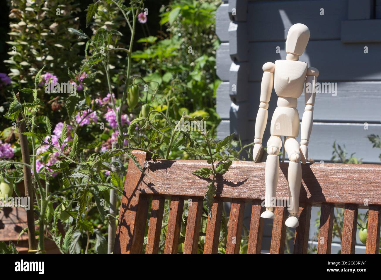 Mannequin sitting on chair in hi-res stock photography and images - Alamy