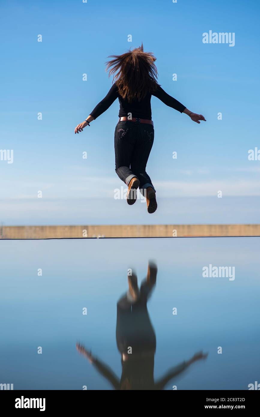 Women jump 50 hi-res stock photography and images - Alamy