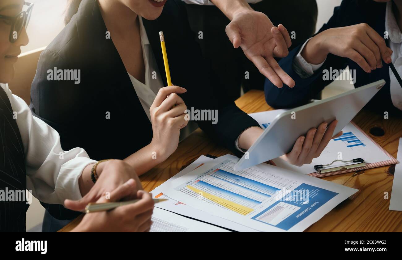 Young of Asian Business People Meeting Conference Discussion Corporate Concept. Stock Photo