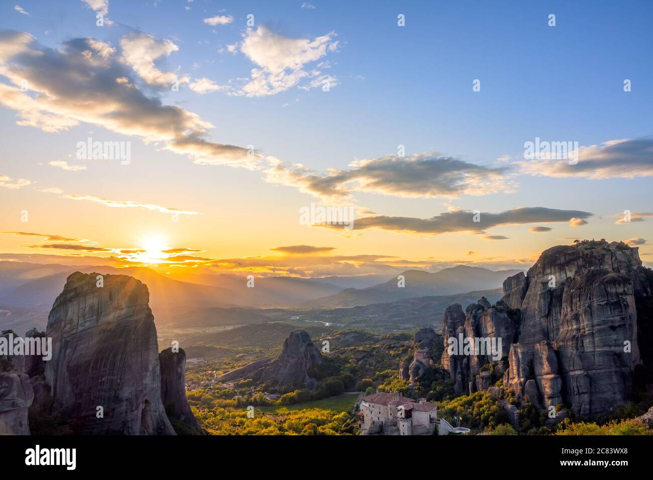 Greece. Summer sunset in Meteora. Monastery on the rocks, listed by UNESCO Stock Photo