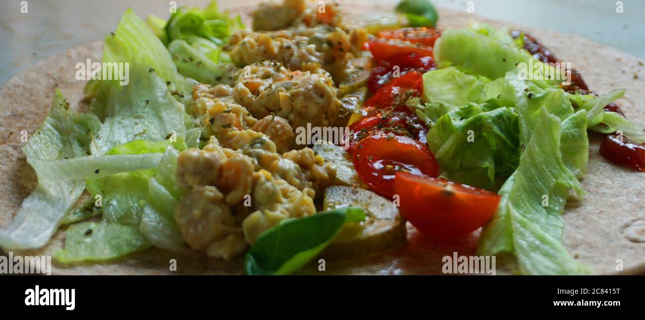 Healthy selfmade veggie Tortilla wrap Stock Photo