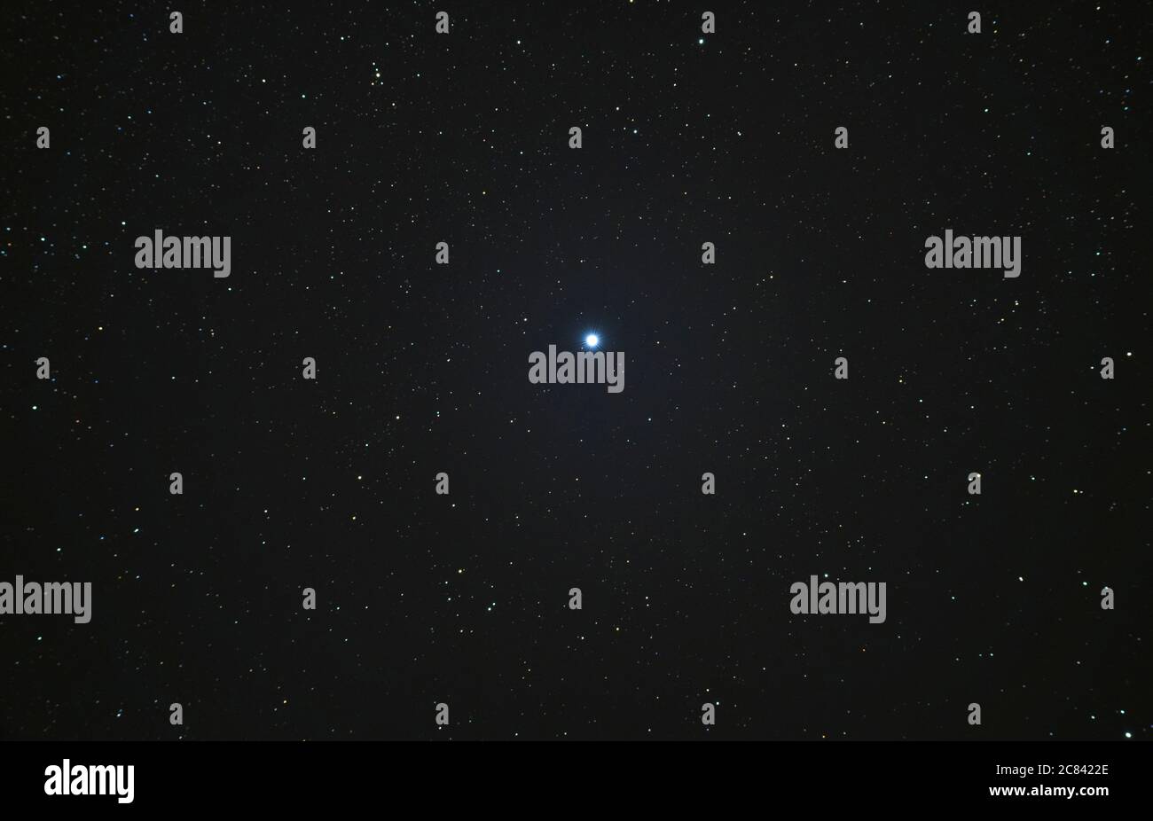 Telescope view of starfield around the blue white star Deneb in the Telescope view of starfield around the blue white star Deneb in the