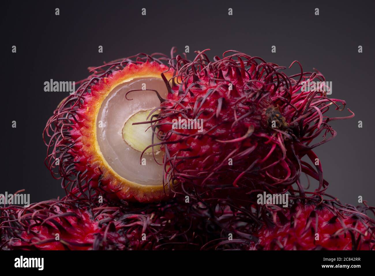 Rambutan tropical exotic edible fruit Stock Photo - Alamy