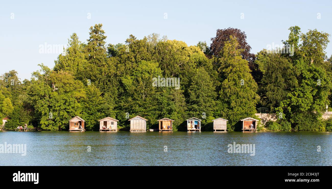 Wessling, Bavaria / Germany - July 7, 2020: Panorama with boat houses at Lake Wessling (Weßlinger See). Scenic upper bavarian landscape. Stock Photo