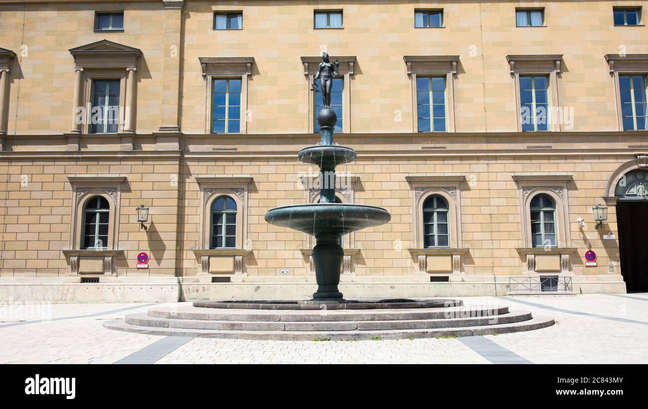Munich, Bavaria / Germany - July 13, 2020: View on the Kronprinz-Rupprecht-Brunnen. A fountain located in front of the Residenz (royal residence). Cre Stock Photo