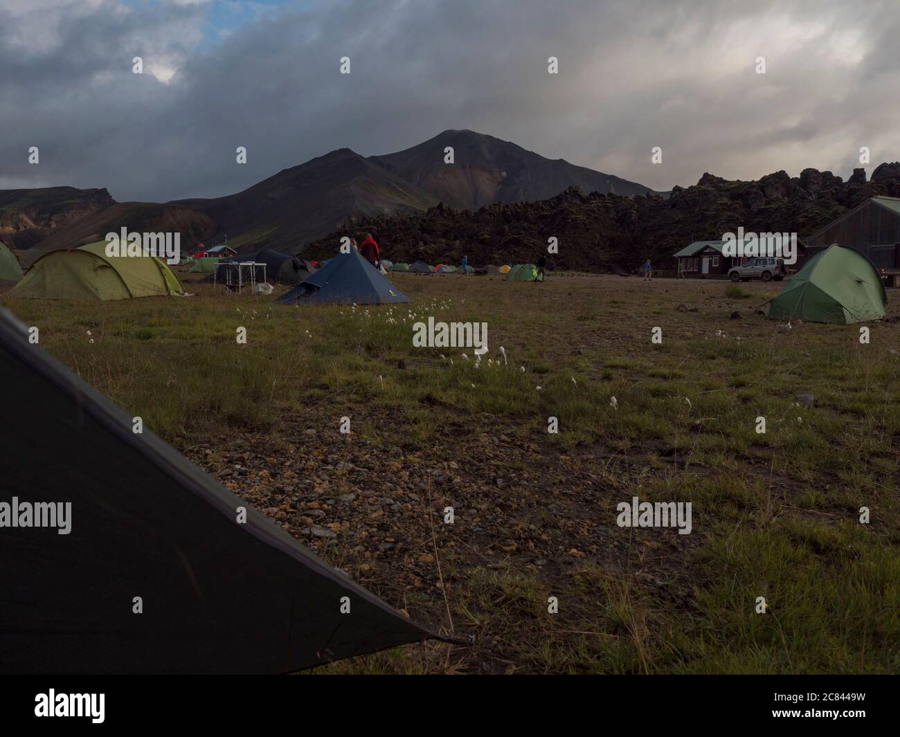 Iceland, Landmannalaugar , July 30, 2019 view on landmannalaugar camp site with cars, tents
