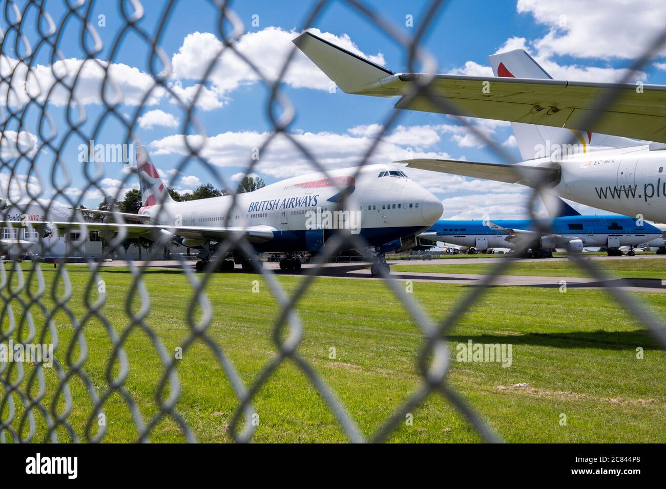 British Airways has recently announced the retirement of it's fleet of 747 aircraft, a decision brough forward due to the impact of the Coronavirus pandemic. This BA 747 is parked at Kemble airfield, Gloucestershire with It's engines allready removed. Based at the airfield 'Air Salvage international' dissasemble aircrfat for parts and scrap materials. Stock Photo