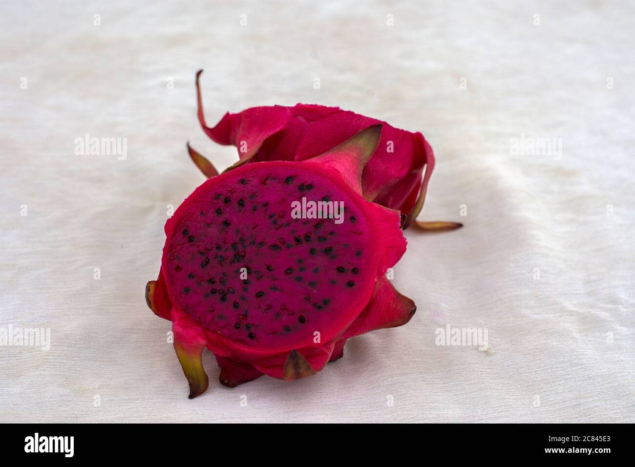 Beautiful red dragon fruit in white background with space for text Stock Photo