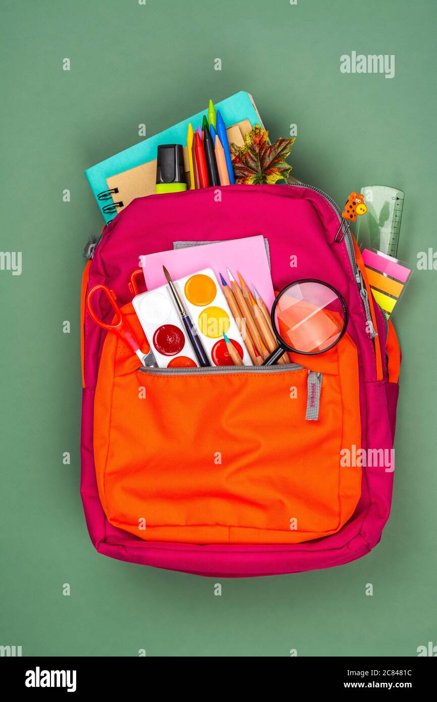 Back pack with school utensils Stock Photo Alamy