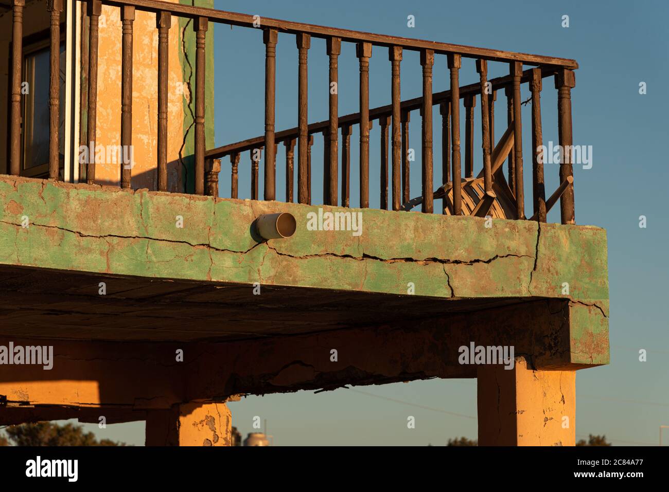 Low angle shot of the balcony of an old abandoned building Stock Photo ...