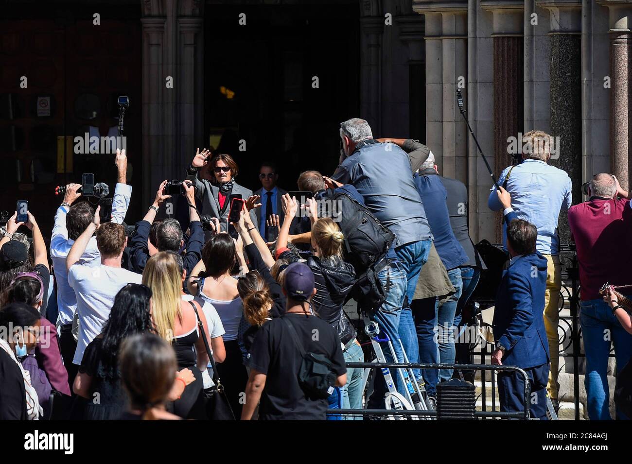 London, UK.  21 July 2020.  Johnny Depp, Hollywood actor, arrives at the High Court to attend his libel case.  Mr Depp is suing The Sun newspaper’s publisher News Group Newspaper, as well as executive editor Dan Wootton, for calling him a ‘wife beater’ in 2018. Mr Depp also that claims allegations of violence against Heard are untrue.  The case continues.  Credit: Stephen Chung / Alamy Live News Stock Photo