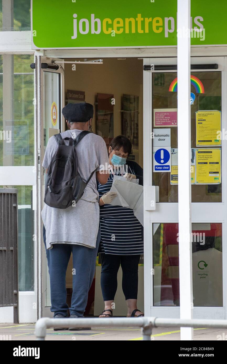 Picture dated July 15th 2020 shows people  outside the job centre in Cambridge.It was announced today the unemployment rate is  2.6 million people.   The number of workers on UK payrolls has fallen by 649,000 between March and June, official figures indicate.  The number of people claiming work-related benefits - including the unemployed - was 2.6 million.  However, the total was not as big as many feared, because large numbers of firms have put employees on the government-backed furlough scheme.  Economists say the full effect on employment will Stock Photo