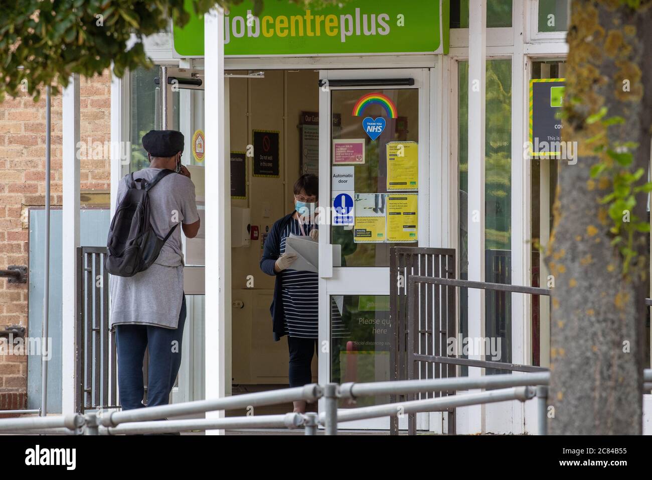 Picture dated July 15th 2020 shows people  outside the job centre in Cambridge.It was announced today the unemployment rate is  2.6 million people.   The number of workers on UK payrolls has fallen by 649,000 between March and June, official figures indicate.  The number of people claiming work-related benefits - including the unemployed - was 2.6 million.  However, the total was not as big as many feared, because large numbers of firms have put employees on the government-backed furlough scheme.  Economists say the full effect on employment will Stock Photo