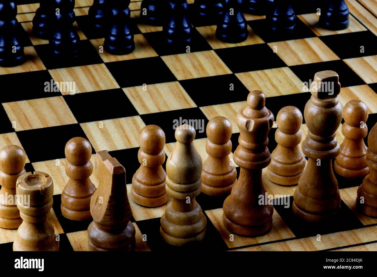 Chess pieces on chess board close up view Stock Photo