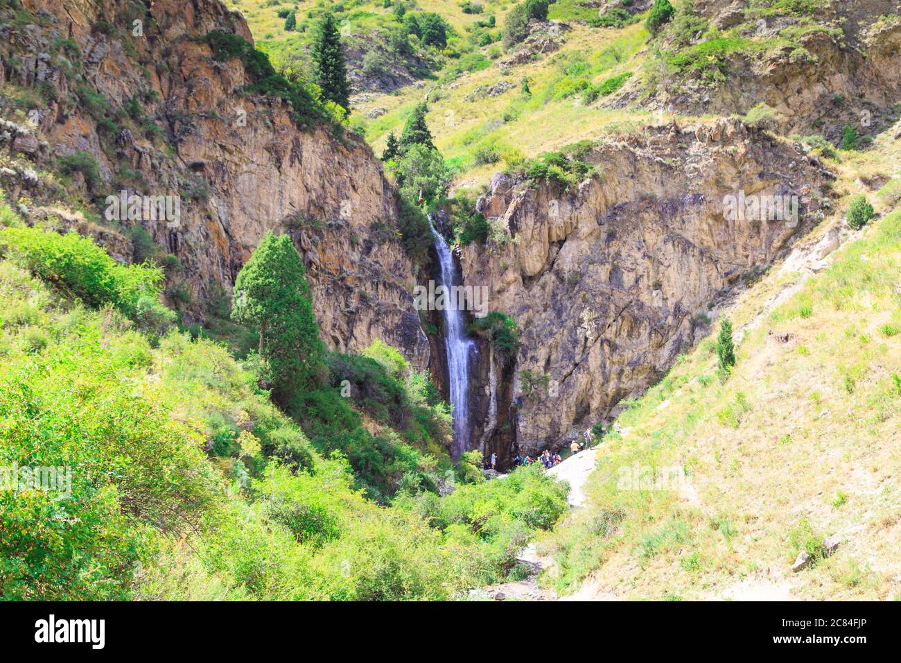 Kegeti waterfall. Background for tourism and travel. Summer landscape. Kegeti Gorge, Kyrgyzstan. Stock Photo