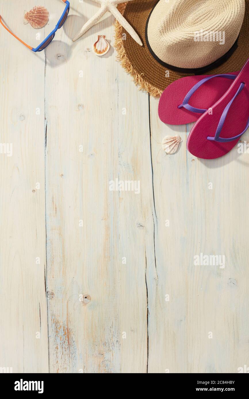Beach items on a wooden background Stock Photo