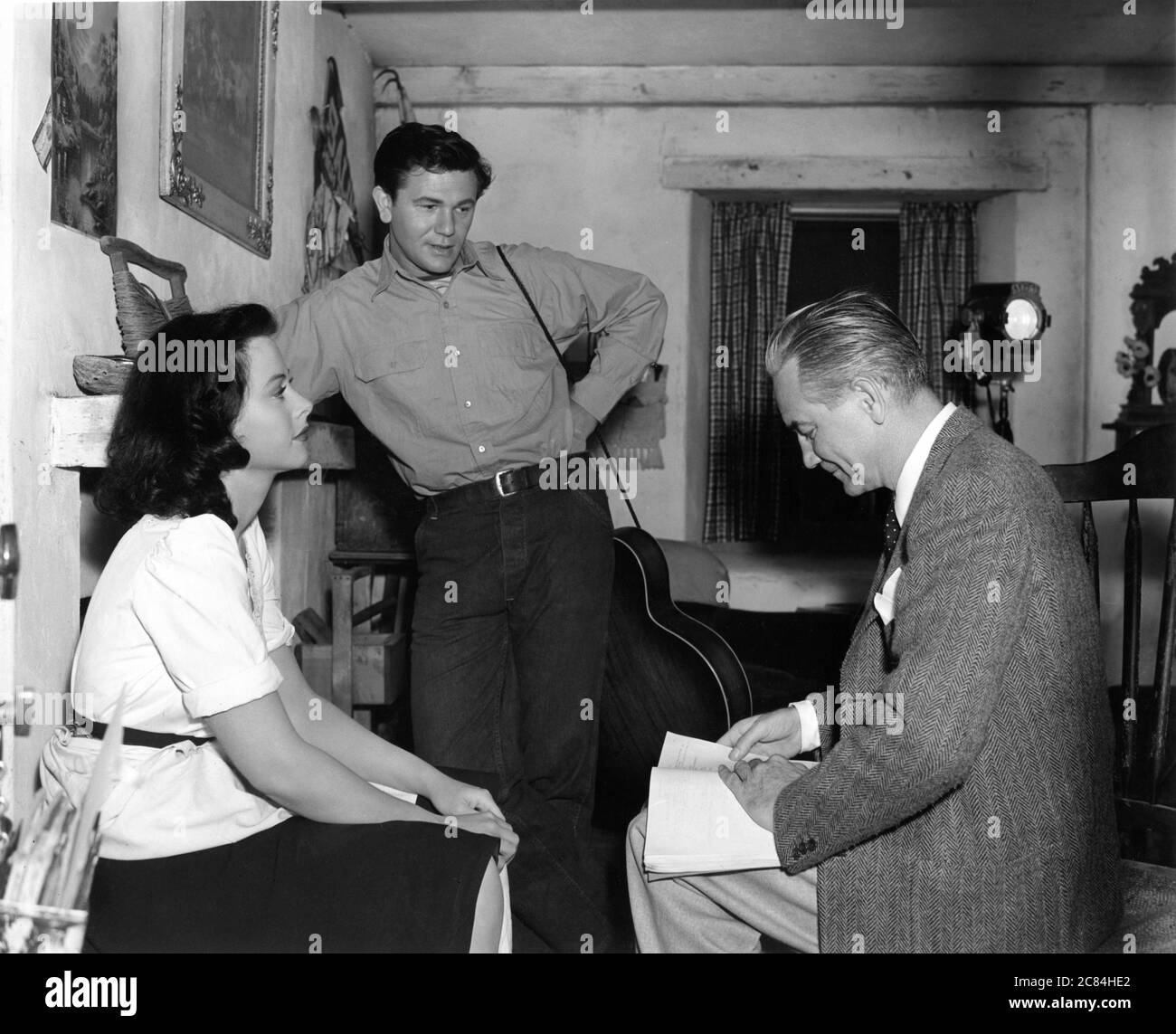 HEDY LAMARR JOHN GARFIELD and Director VICTOR FLEMING on set candid