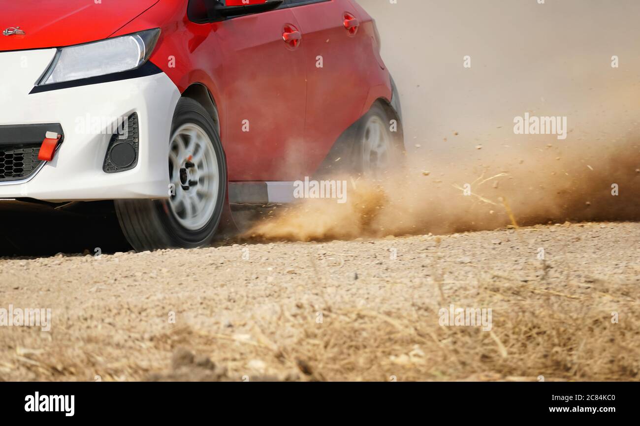 Rally racing car on dirt road Stock Photo - Alamy