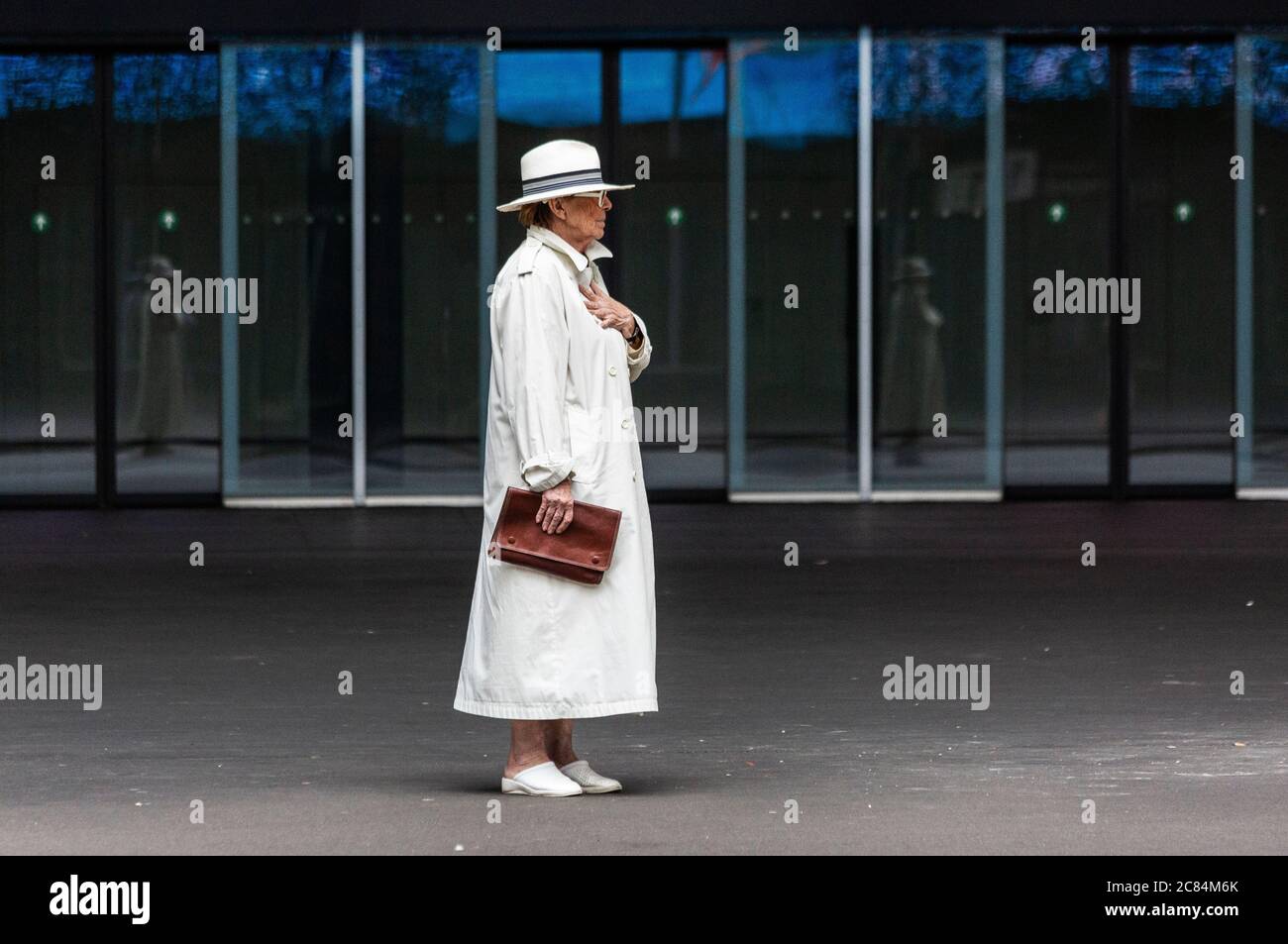 Woman in white coat wearing hi-res stock photography and images - Alamy