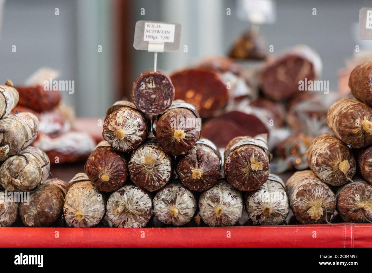 Meats for sale on a food stall in Basel Stock Photo